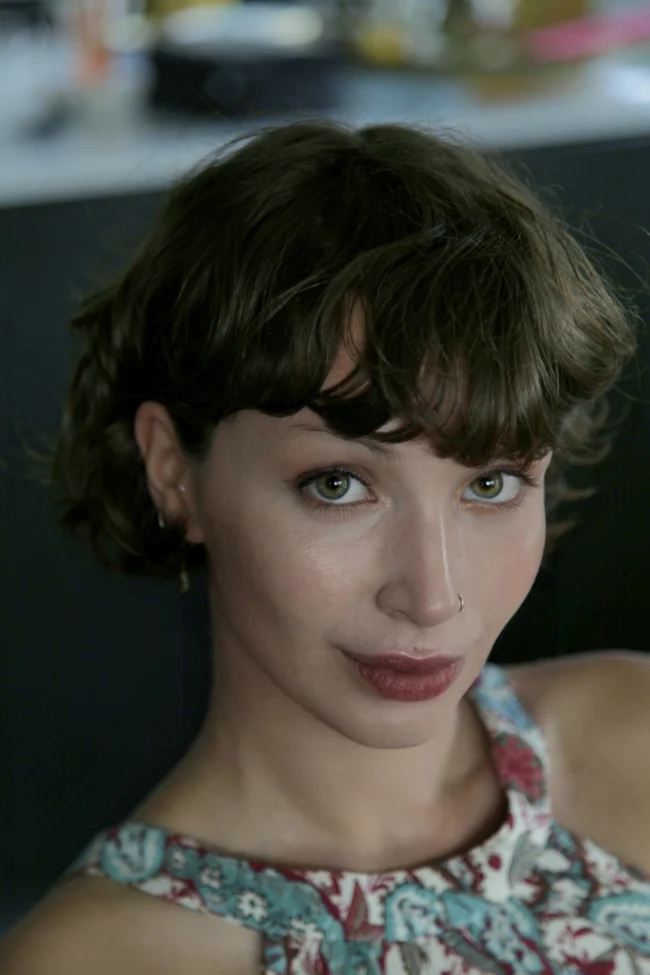 Natural editorial make-up with luminous skin, a nose ring and tousled French fringe by Blandine Lagoutte